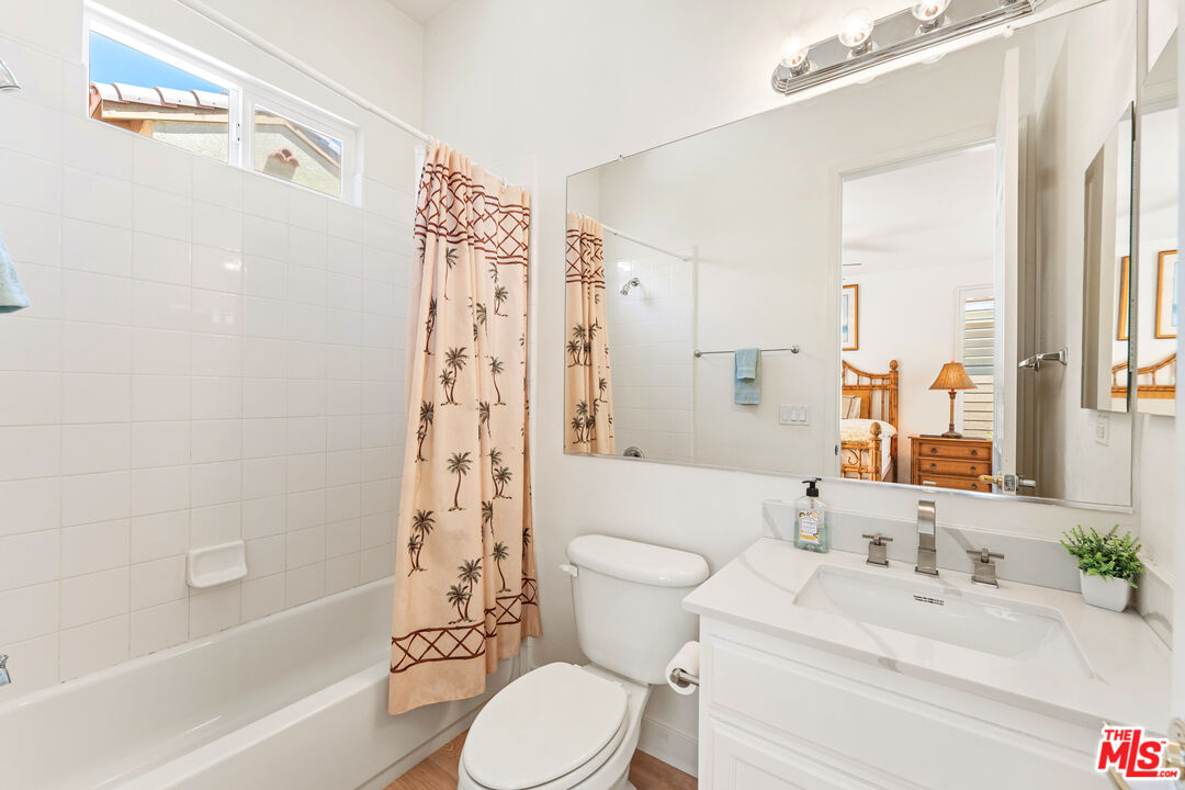 65 Shoreline Drive Rancho Mirage, CA 92270 - Photo 19 of 37 a bathroom with a sink a toilet and a bathtub