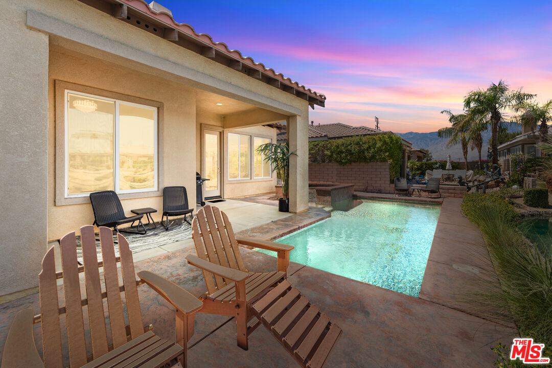 65 Shoreline Drive Rancho Mirage, CA 92270 - Photo 2 of 37 a balcony with table and chairs