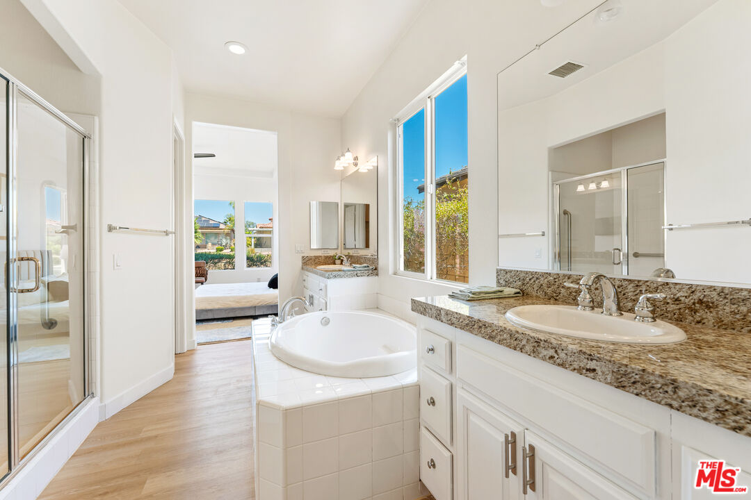 65 Shoreline Drive Rancho Mirage, CA 92270 - Photo 21 of 37 a en suite bathroom with a sink double vanity