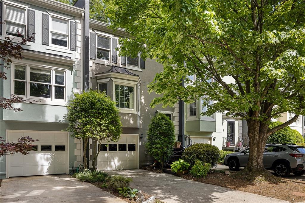 28 Sycamore Station Decatur, GA 30030 - Photo 1 of 1 a front view of a house with garden