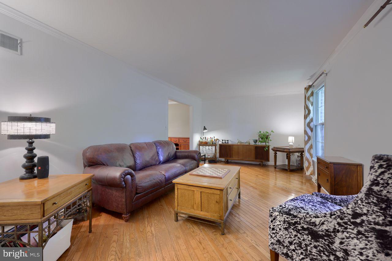 102 Suncrest Road Lancaster, PA 17601 - Photo 14 of 40 a living room with furniture and wooden floor