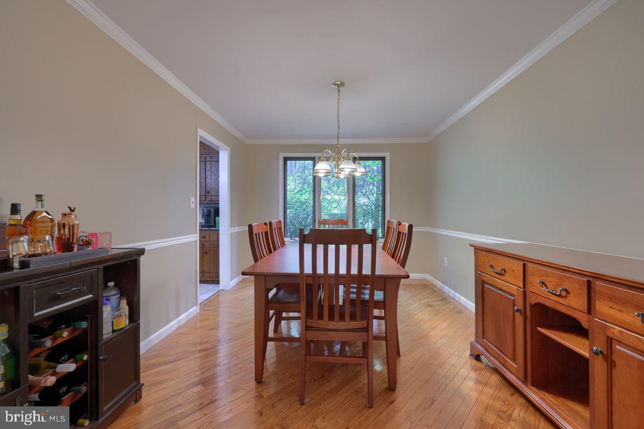 102 Suncrest Road Lancaster, PA 17601 - Photo 16 of 40 a view of a dining room with furniture window and wooden floor