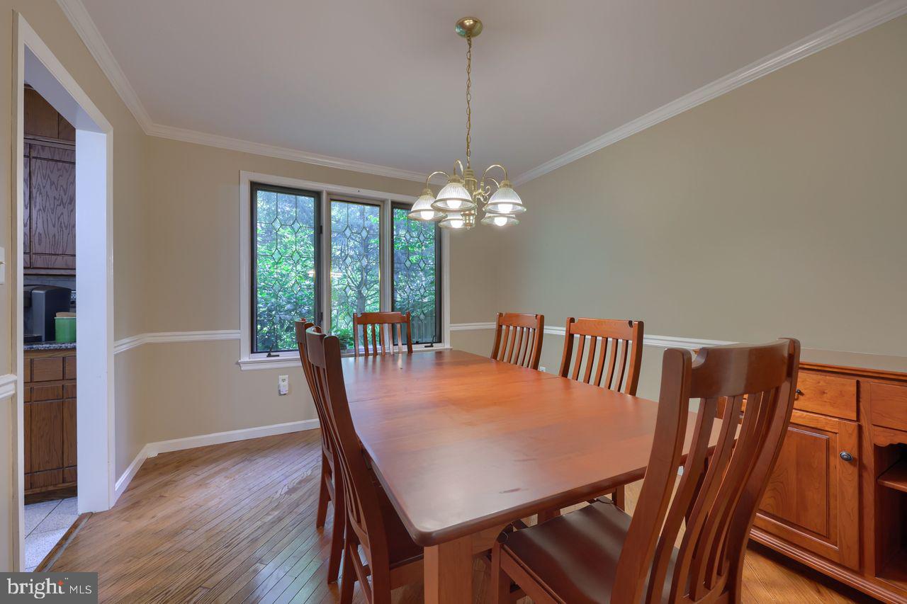 102 Suncrest Road Lancaster, PA 17601 - Photo 17 of 40 a view of a dining room with furniture window and wooden floor