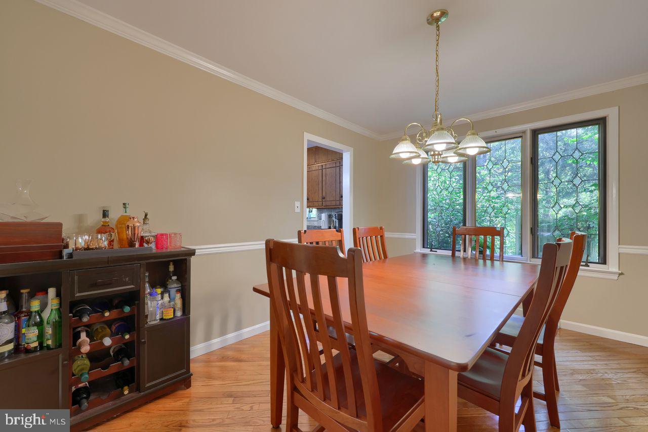 102 Suncrest Road Lancaster, PA 17601 - Photo 18 of 40 a view of a dining room with furniture window and wooden floor