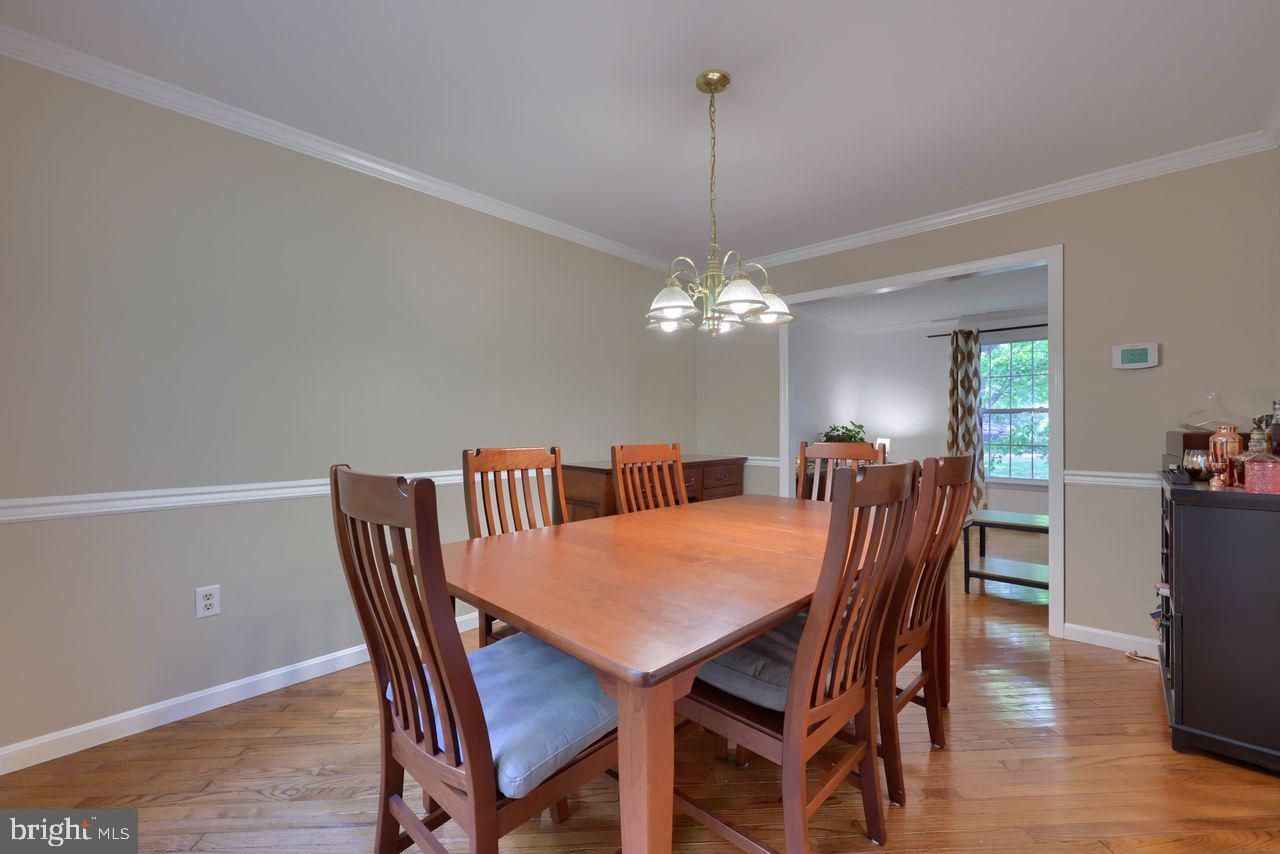 102 Suncrest Road Lancaster, PA 17601 - Photo 19 of 40 a view of a dining room with furniture window and wooden floor