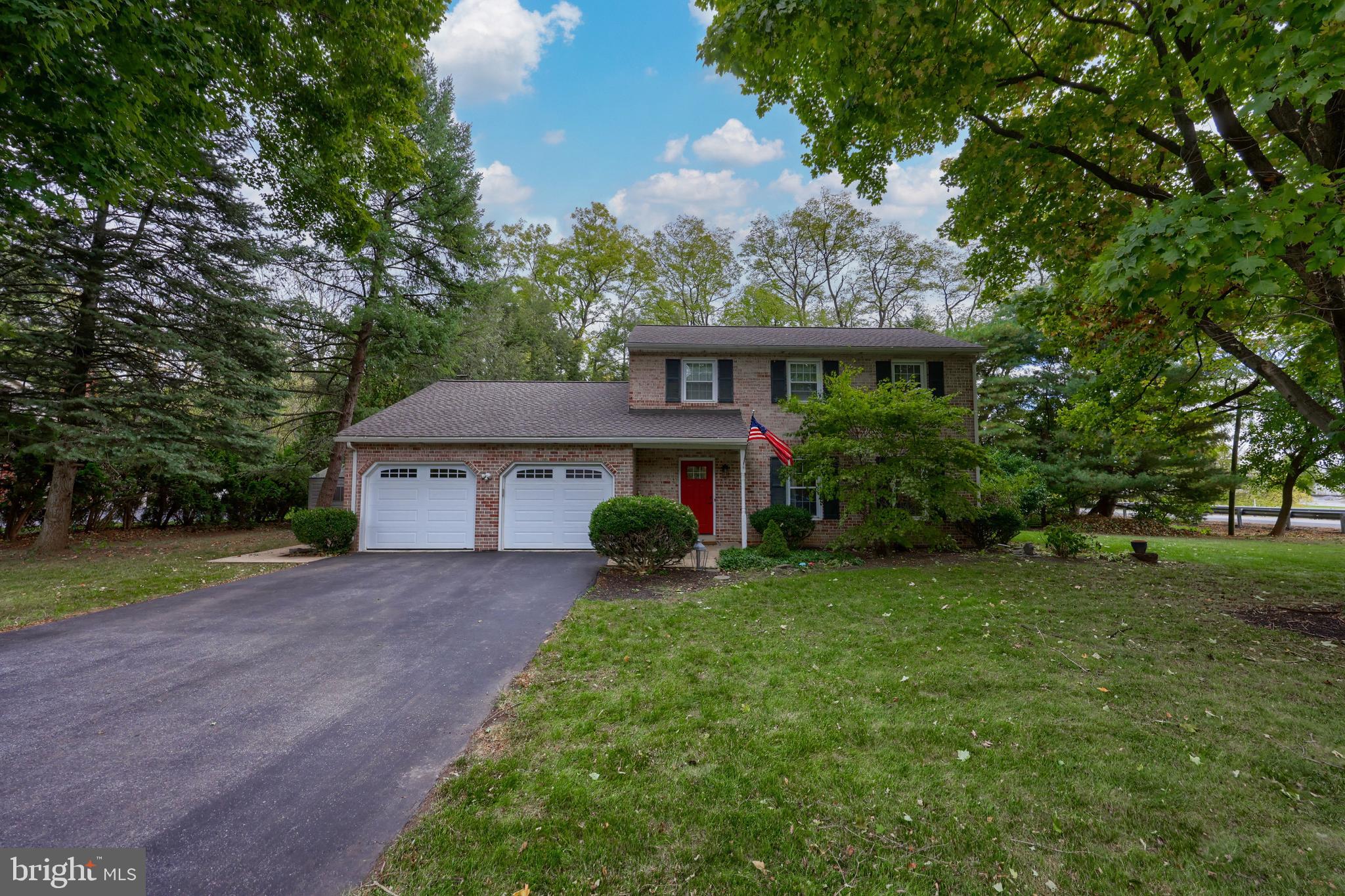 102 Suncrest Road Lancaster, PA 17601 - Photo 2 of 40 a front view of a house with garden