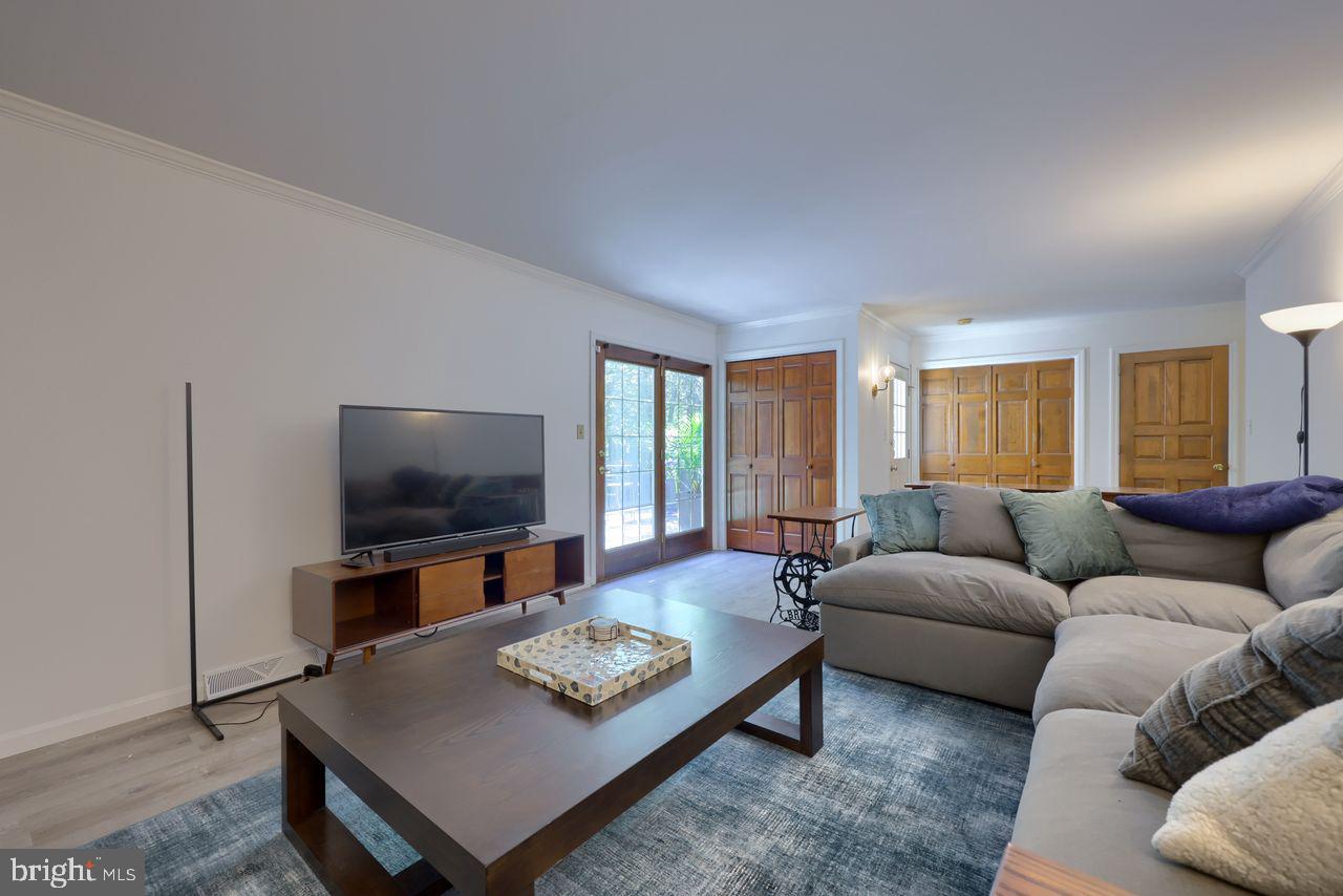 102 Suncrest Road Lancaster, PA 17601 - Photo 30 of 40 a living room with furniture and a flat screen tv