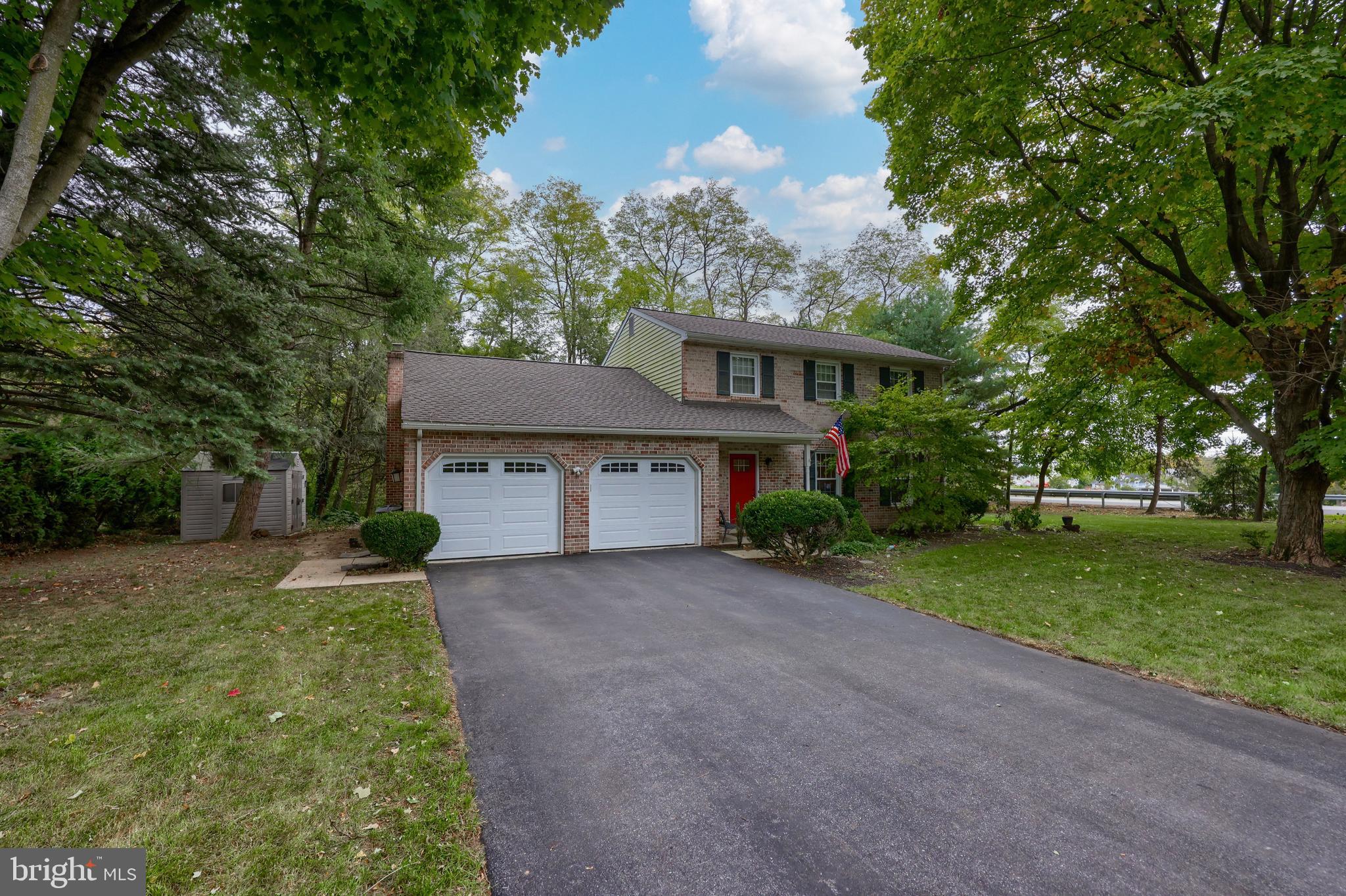 102 Suncrest Road Lancaster, PA 17601 - Photo 3 of 40 front view of a house with a yard