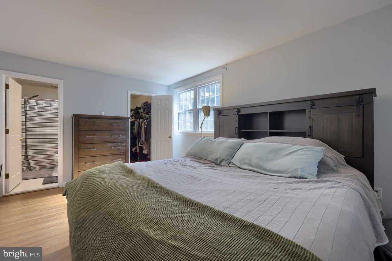 102 Suncrest Road Lancaster, PA 17601 - Photo 32 of 40 a bedroom with a large bed and a dresser
