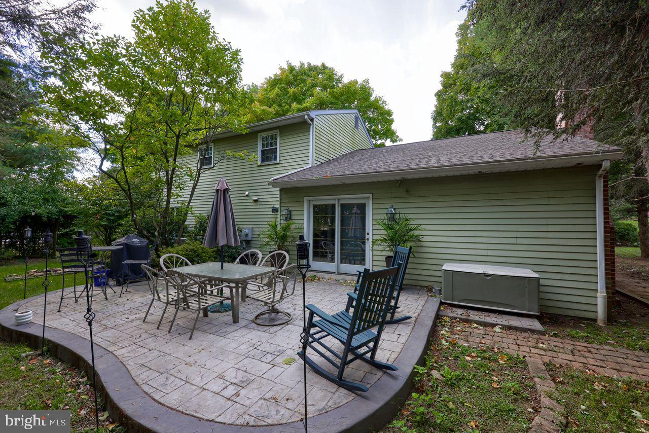 102 Suncrest Road Lancaster, PA 17601 - Photo 6 of 40 a view of a house with backyard sitting area and garden