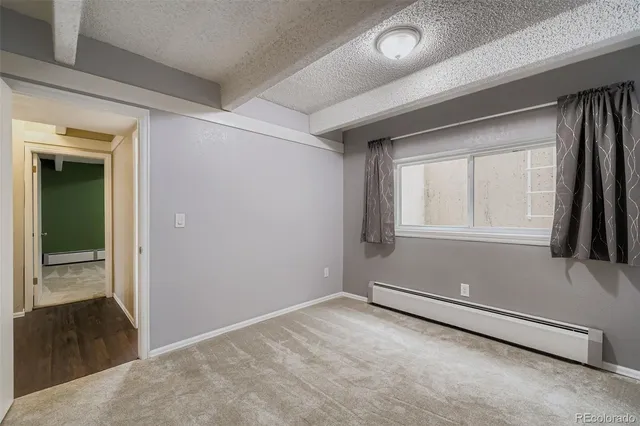 wooden floor and window in an empty room