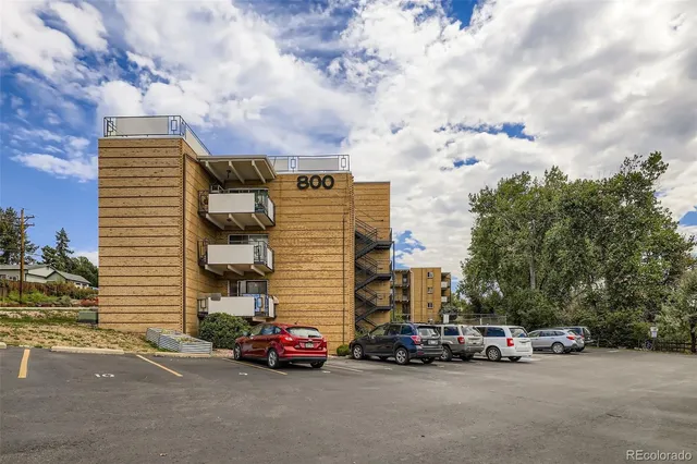 a view of a street in front of a building