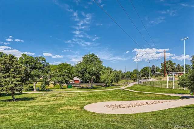 a view of a building with sitting area