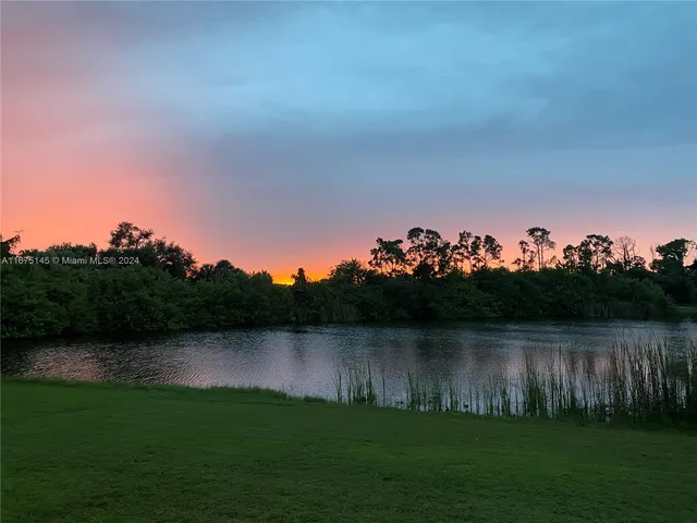 a view of an ocean and mountain