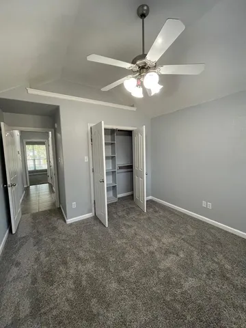 a bathroom with a sink toilet and mirror