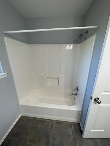 en view of an empty room with a window