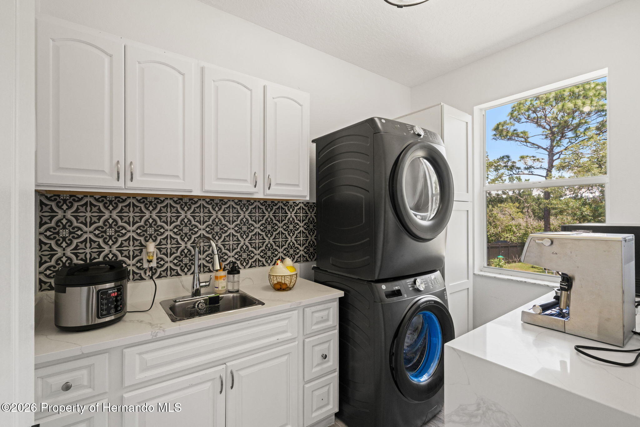 11360 Lark Sparrow Road Weeki Wachee, FL 34614 - Photo 19 of 59 Laundry room (washer/dryer) do not convey