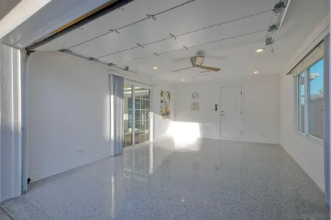 a view of a porch with wooden floor and stairs