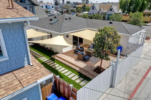a view of a house with a street