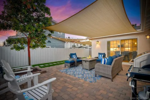an aerial view of multiple house with yard