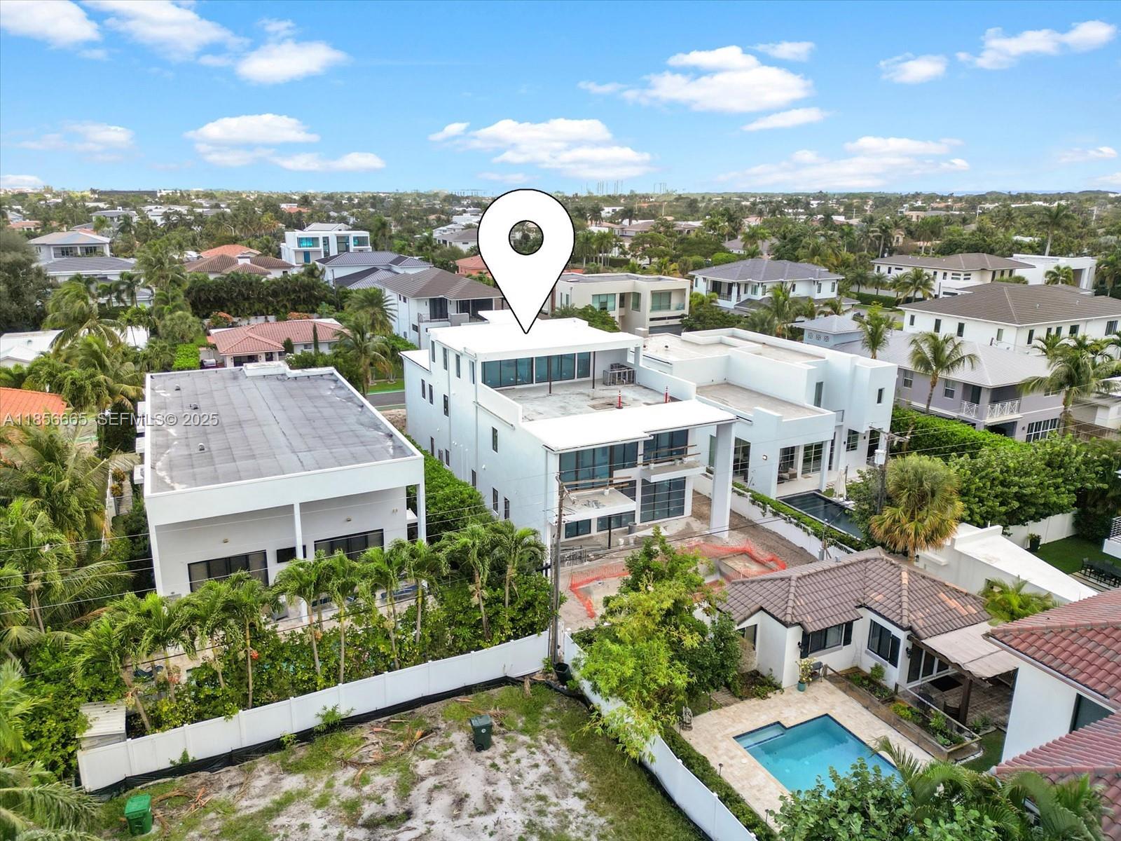 344 Northeast 2nd Street Boca Raton, FL 33432 - Photo 6 of 12 an aerial view of a house with a garden