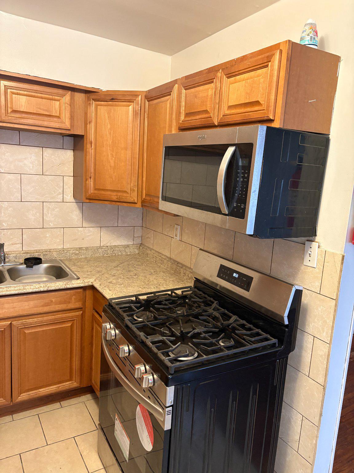 3419 Carter Lane Chester, PA 19013 - Photo 11 of 52 Unit 1-Cozy kitchen with modern appliances.