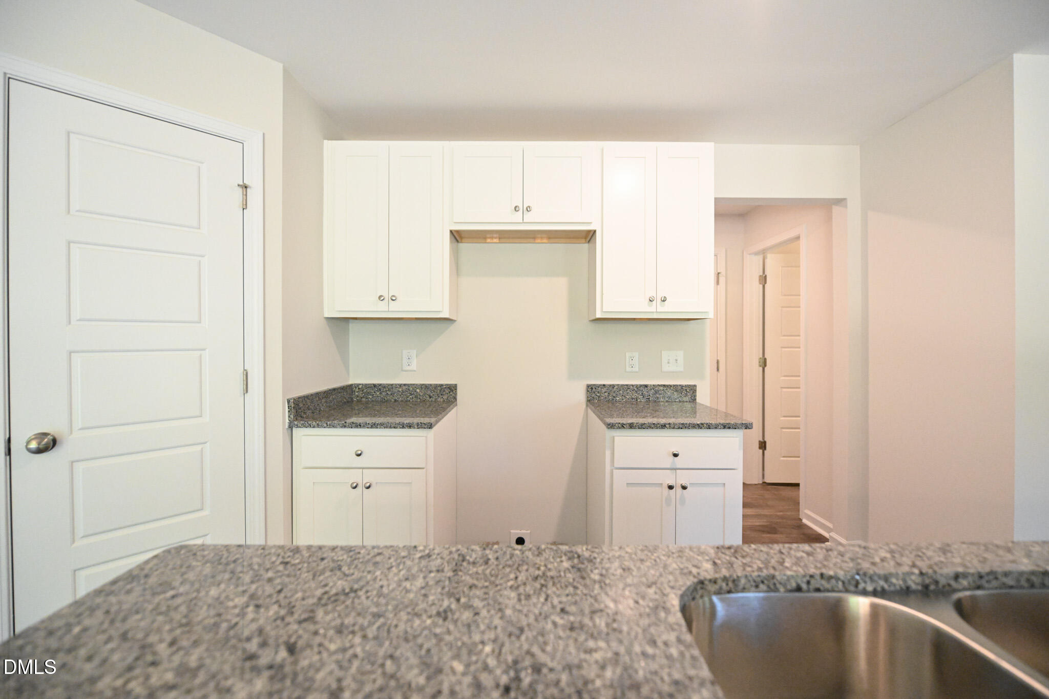 2009 Black Bear Court, Unit (LOT 5) Hope Mills, NC 28348 - Photo 12 of 29 a kitchen with granite countertop a sink a stove and cabinets