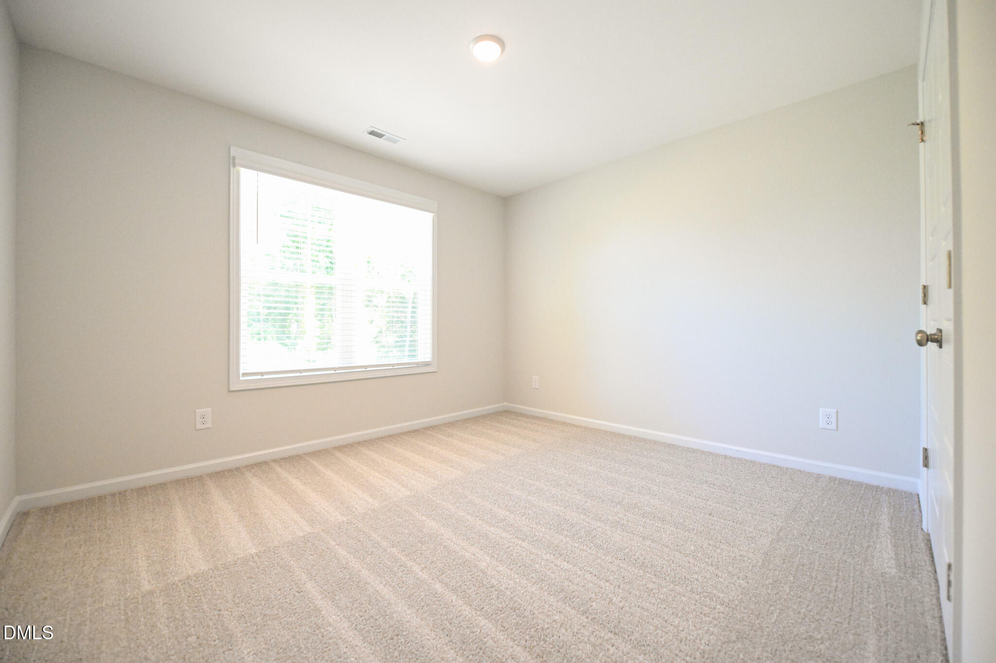 2009 Black Bear Court, Unit (LOT 5) Hope Mills, NC 28348 - Photo 26 of 29 an empty room with a window