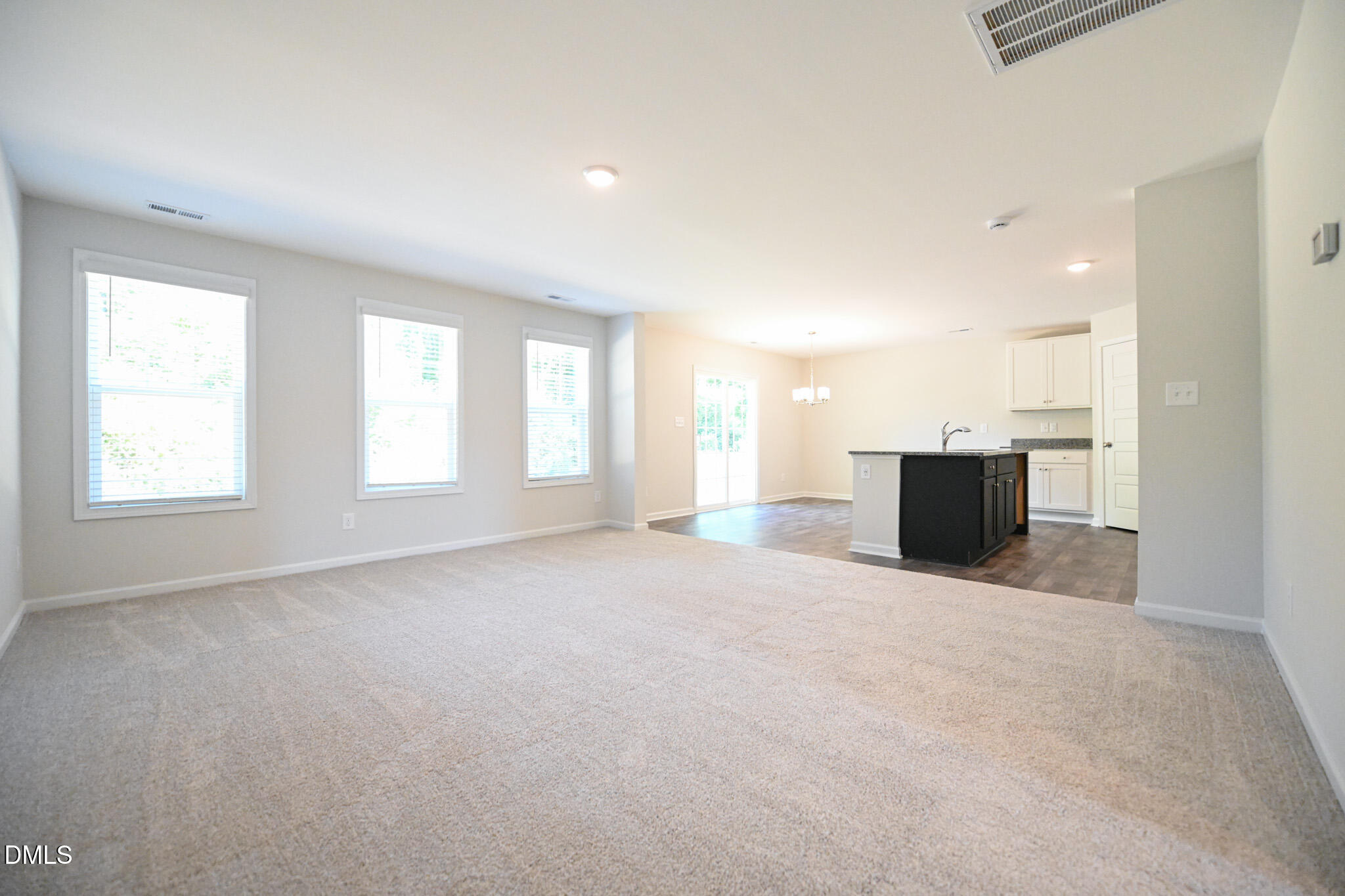 2009 Black Bear Court, Unit (LOT 5) Hope Mills, NC 28348 - Photo 6 of 29 an empty room with windows and fireplace