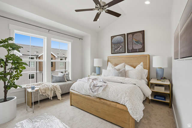7338 South Seven Tree Lane, Unit 75 Midvale, UT 84047 - Photo 15 of 30 Bedroom featuring ceiling fan, carpet floors, and lofted ceiling