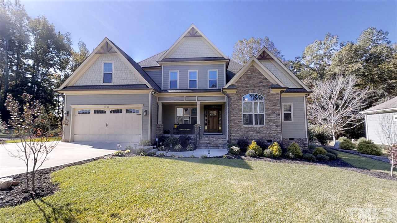 3128 Constance Circle Raleigh, NC 27603 - Photo 1 of 25 a house view with a outdoor space