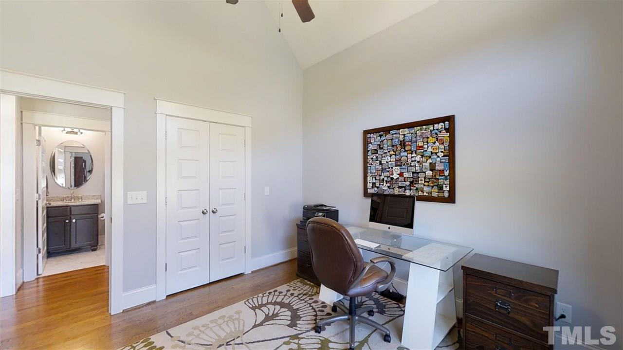 3128 Constance Circle Raleigh, NC 27603 - Photo 14 of 25 a workspace with furniture and wooden floor