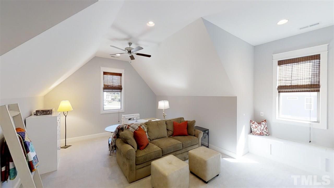 3128 Constance Circle Raleigh, NC 27603 - Photo 24 of 25 a living room with furniture and a window