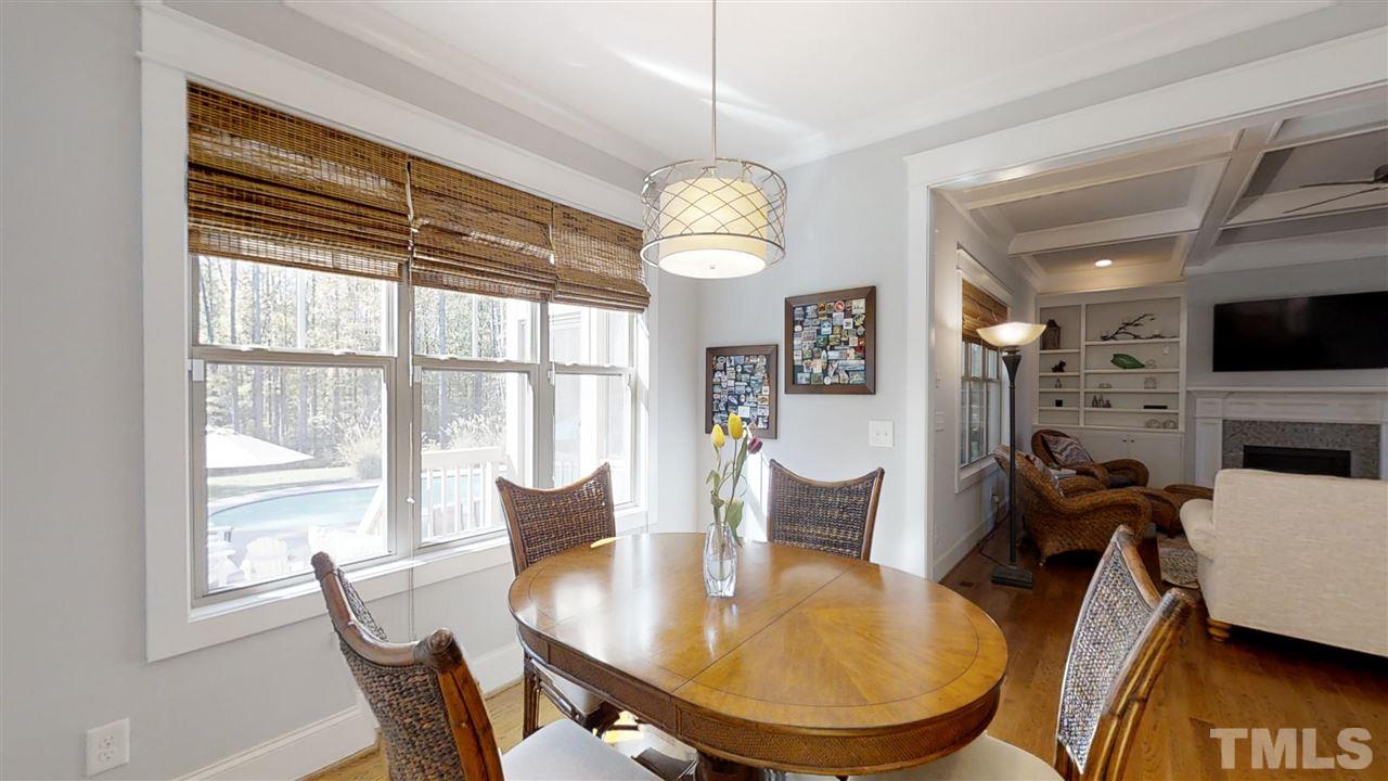 3128 Constance Circle Raleigh, NC 27603 - Photo 10 of 25 a view of a dining room with furniture window and wooden floor