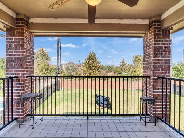a view of a balcony with a swing