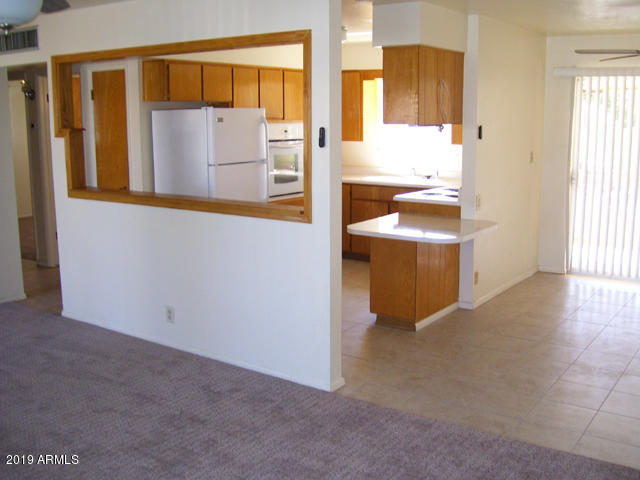 5233 Casper Road Mesa, AZ 85205 - Photo 9 of 23 View Into Kitchen