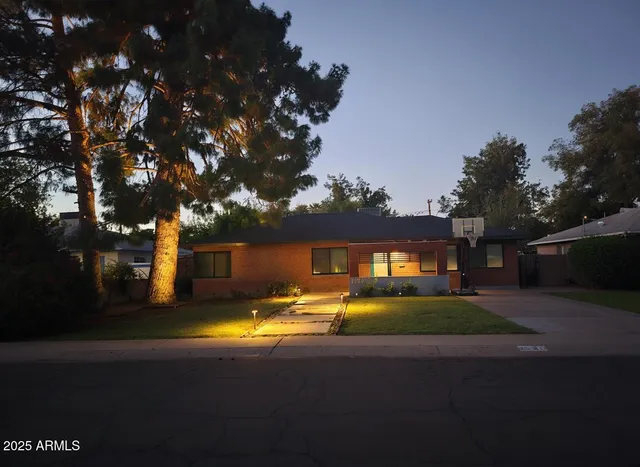 a view of swimming pool is middle in the backyard