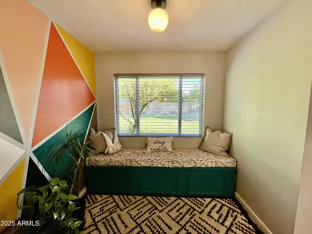 a room with window and a table