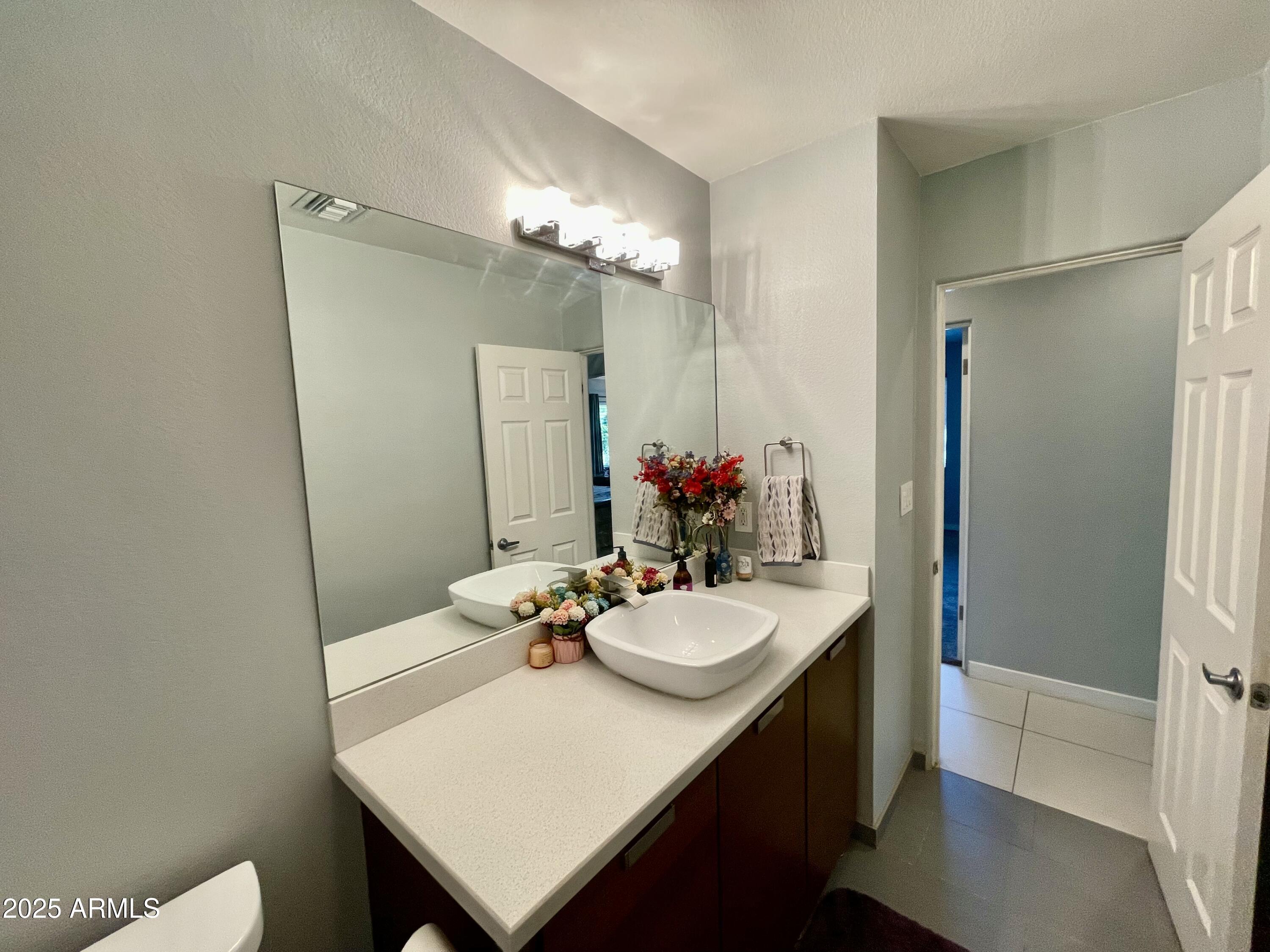 1520 West Berridge Lane Phoenix, AZ 85015 - Photo 26 of 46 a view of a dining room with furniture and wooden floor