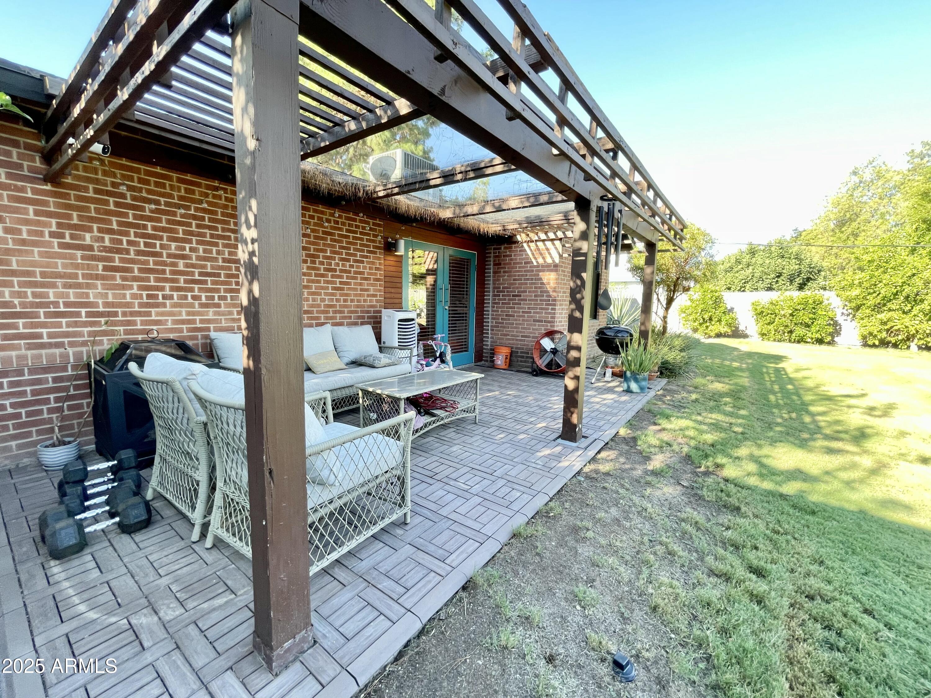 1520 West Berridge Lane Phoenix, AZ 85015 - Photo 42 of 46 a view of a chairs and table in the patio