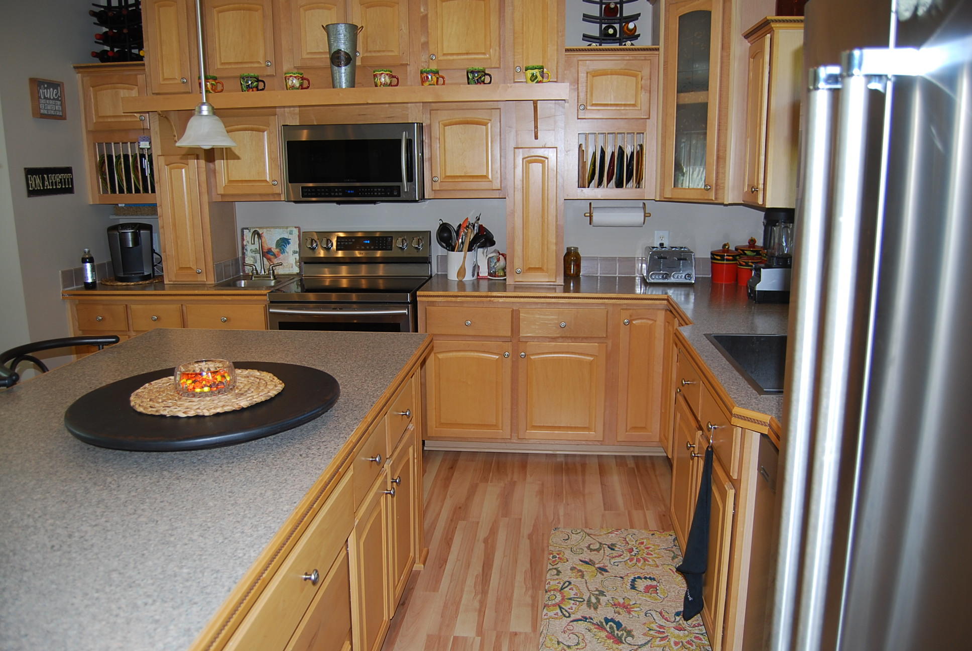 2342 Dillards Hill Road Union Hall, VA 24176 - Photo 29 of 51 a kitchen with stainless steel appliances a stove and a refrigerator