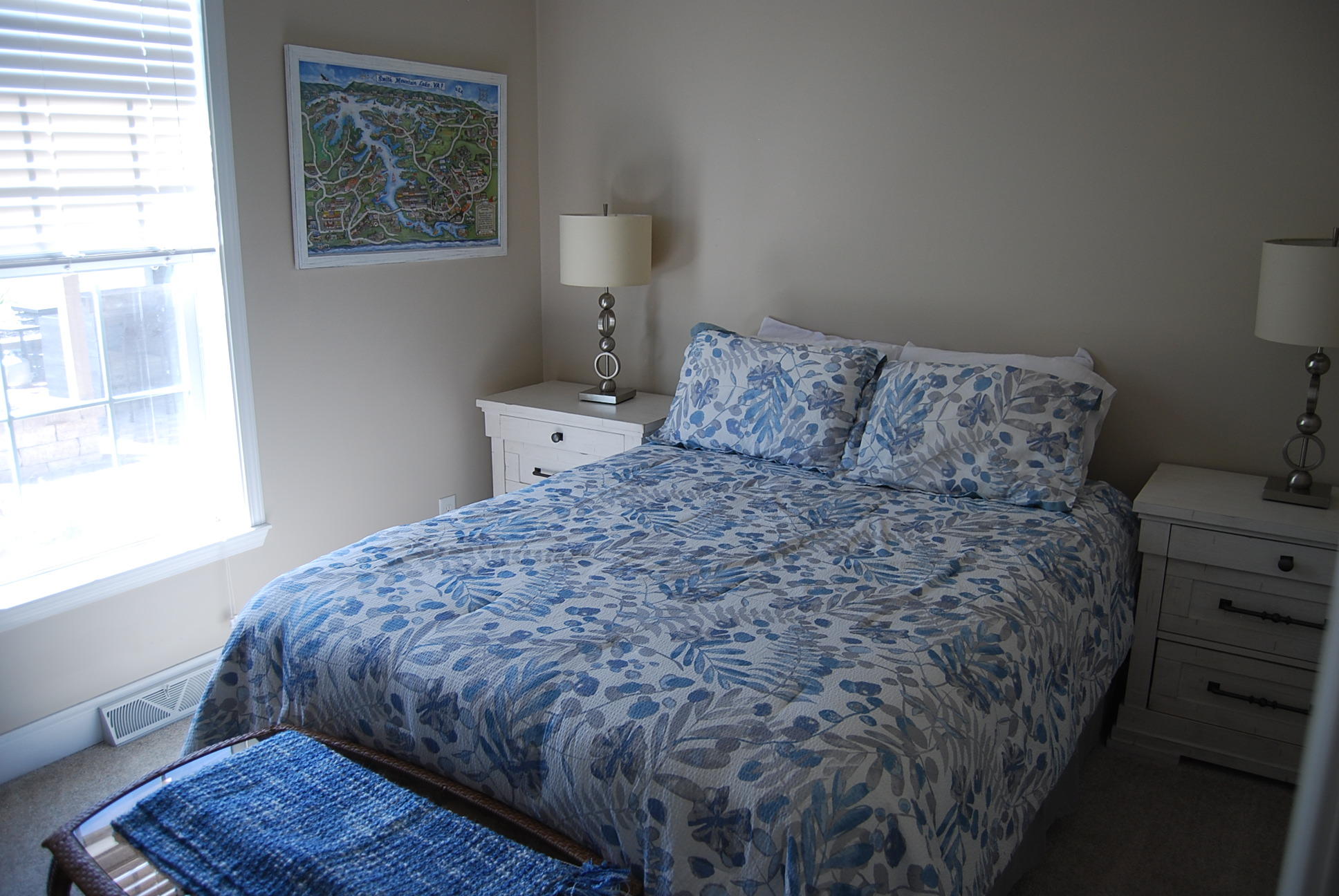 2342 Dillards Hill Road Union Hall, VA 24176 - Photo 44 of 51 a bedroom with a bed and wooden floor