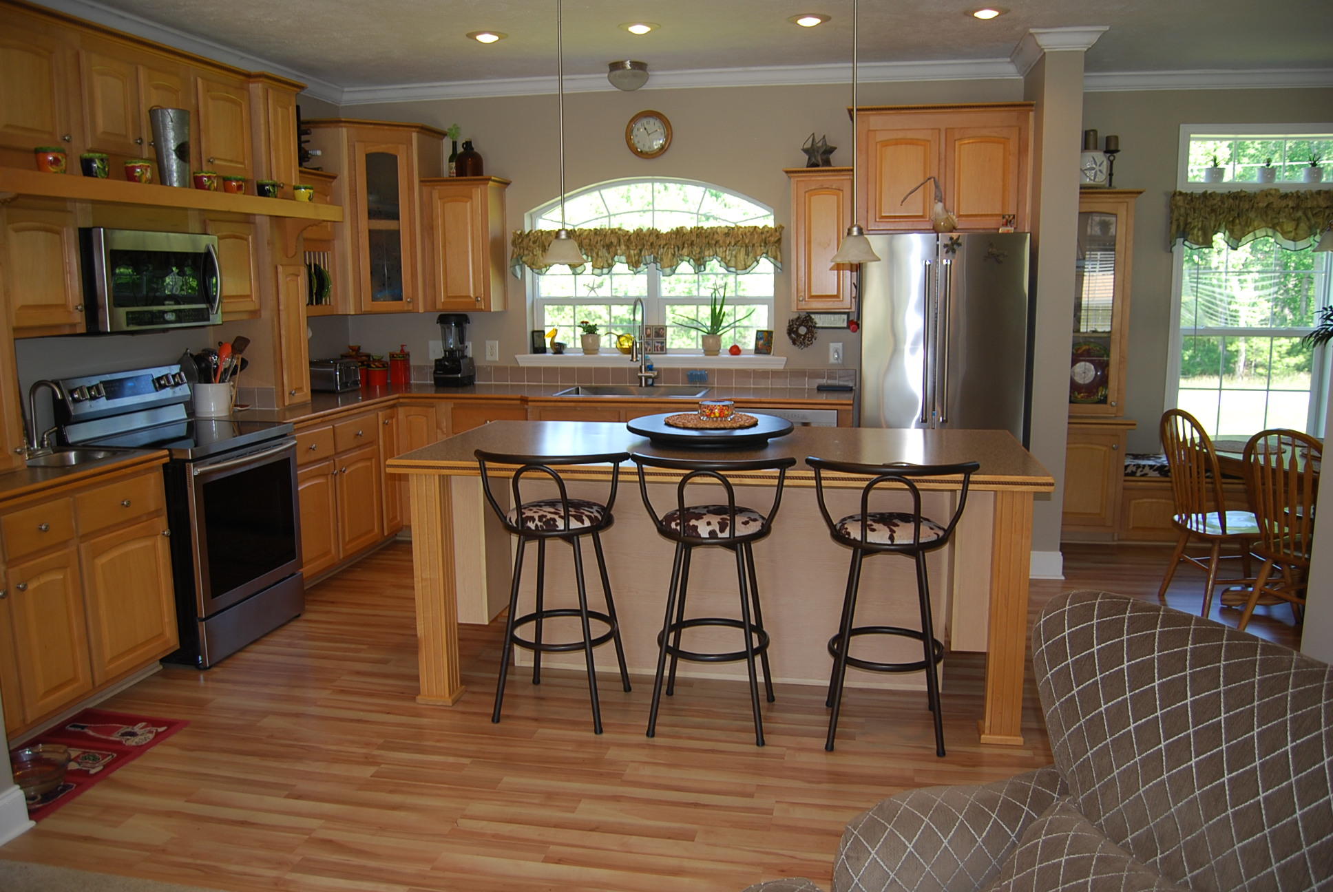 2342 Dillards Hill Road Union Hall, VA 24176 - Photo 6 of 51 a kitchen with stainless steel appliances granite countertop a table chairs and a refrigerator
