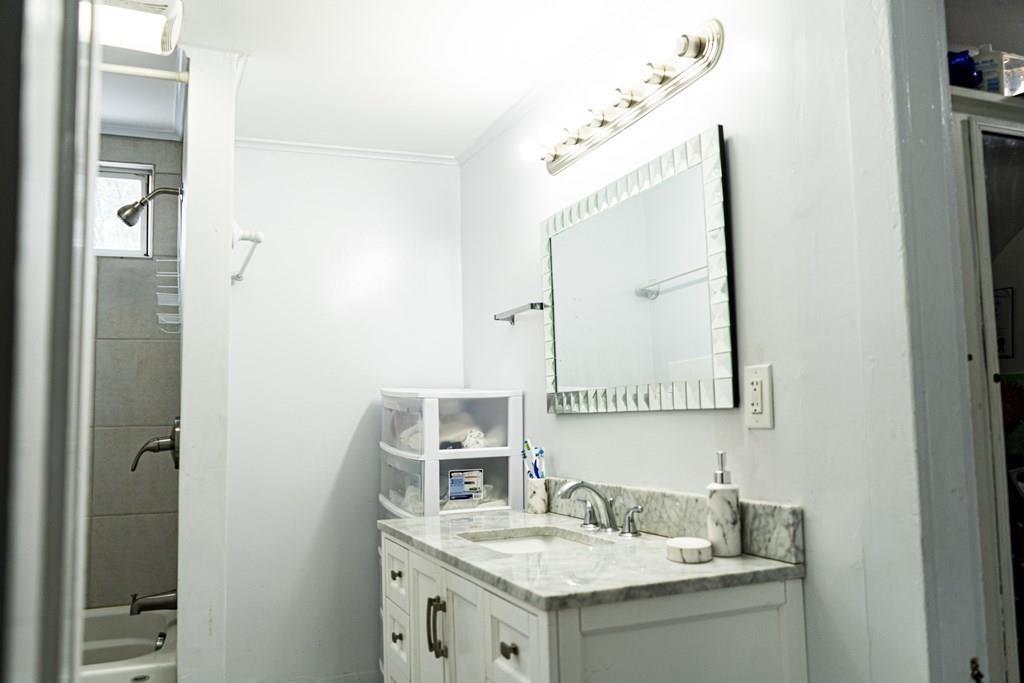 107 Ranney Street Springfield, MA 01108 - Photo 20 of 21 a bathroom with a sink and a mirror