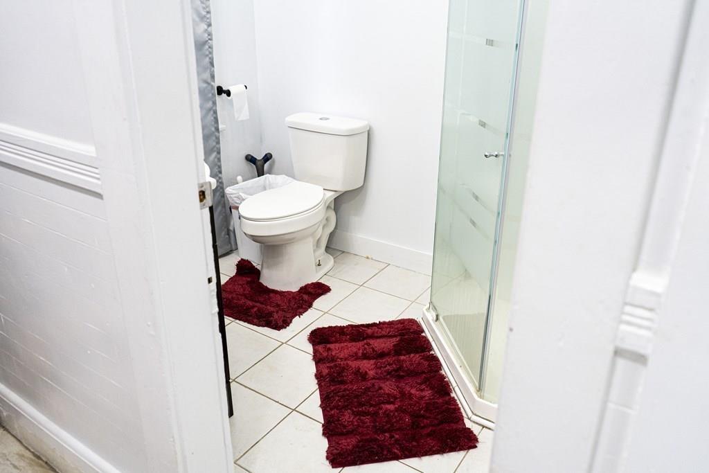 107 Ranney Street Springfield, MA 01108 - Photo 8 of 21 a bathroom with a toilet and a shower