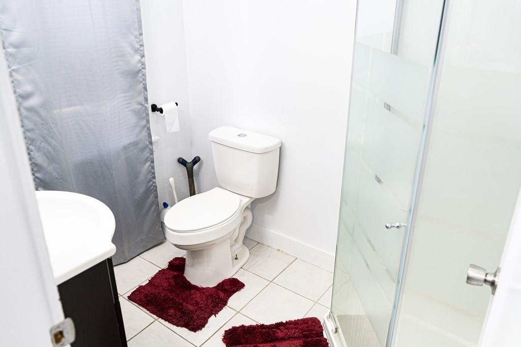 107 Ranney Street Springfield, MA 01108 - Photo 9 of 21 a bathroom with a toilet and a shower