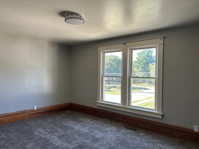 an empty room with window