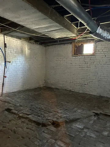 a view of a balcony and front view of a house