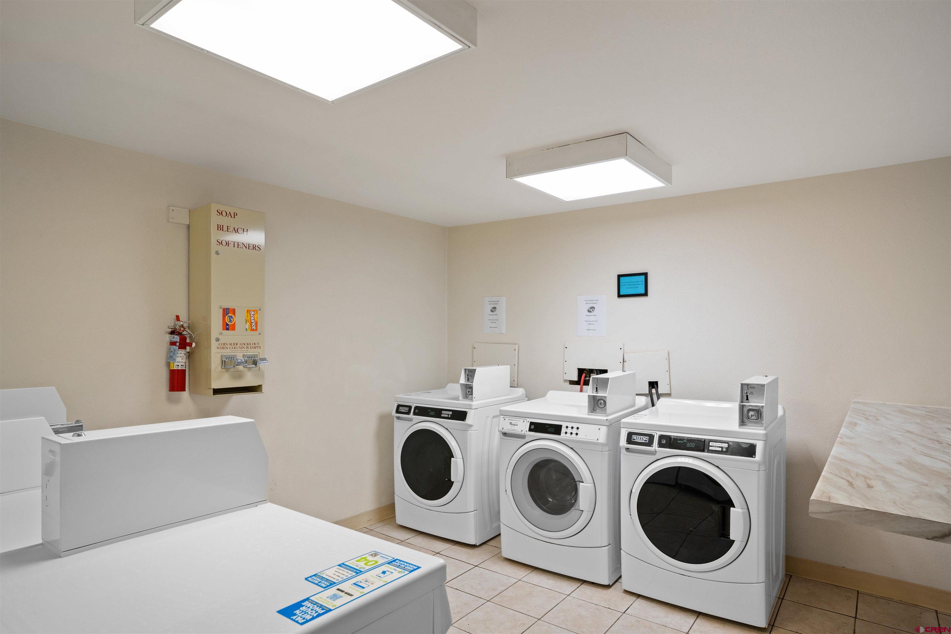 701 Gothic Road, Unit 143 Crested Butte, CO 81225 - Photo 18 of 30 a utility room with dryer and washer
