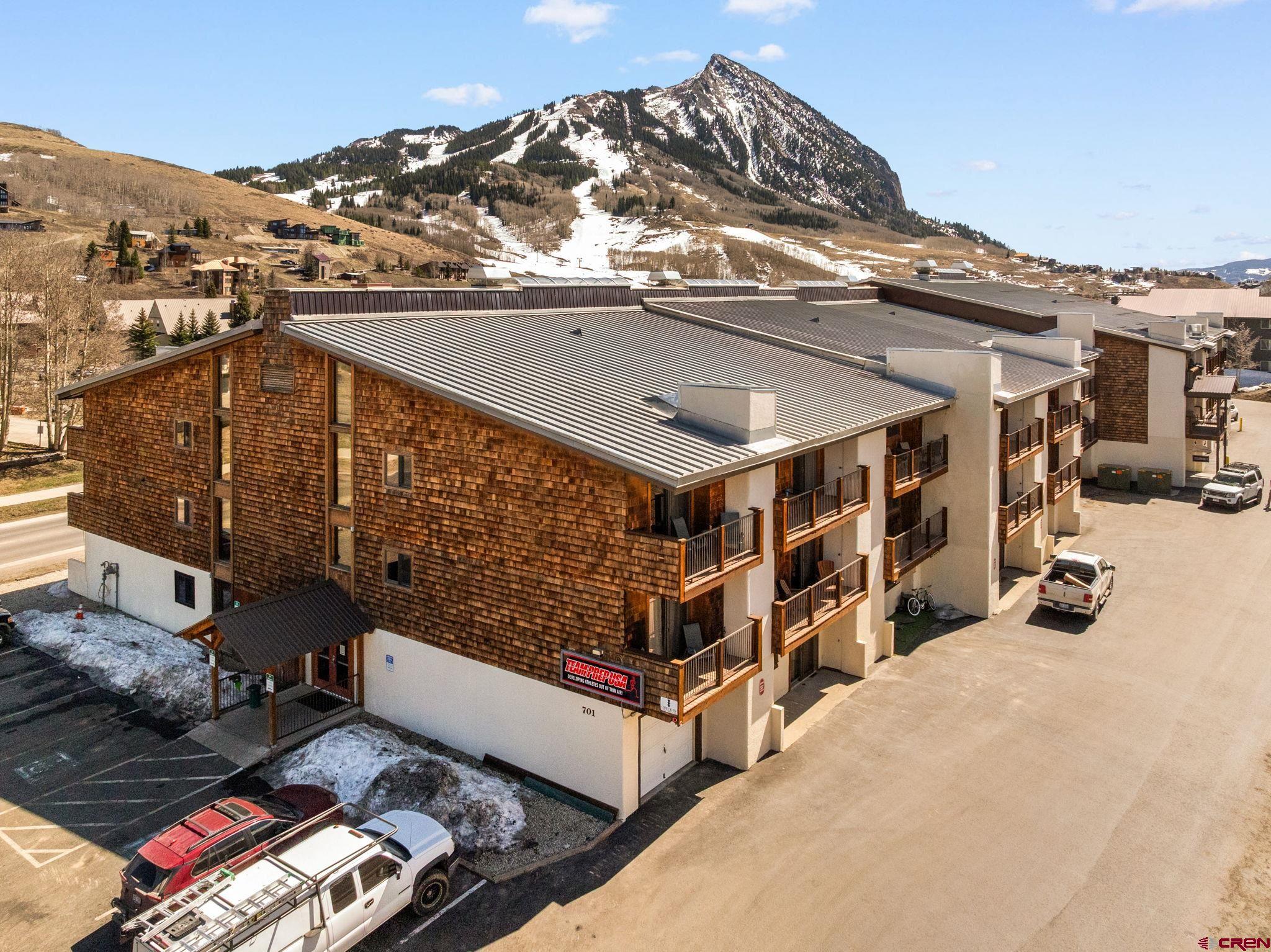 701 Gothic Road, Unit 143 Crested Butte, CO 81225 - Photo 25 of 30 a view of a building with a outdoor space